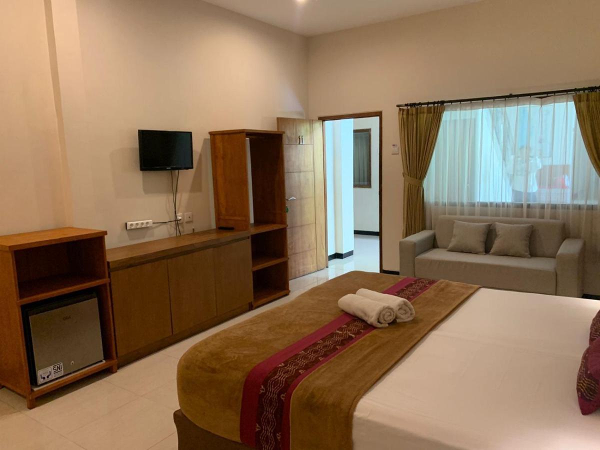 Kuta Suci Guesthouse Ngoại thất bức ảnh