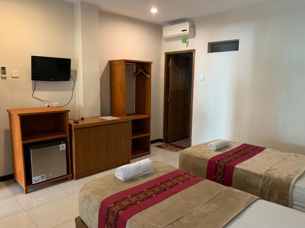 Kuta Suci Guesthouse Ngoại thất bức ảnh