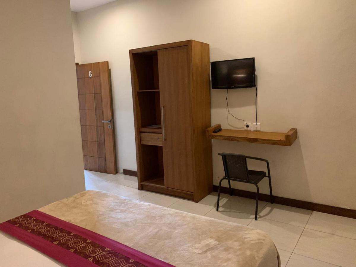 Kuta Suci Guesthouse Ngoại thất bức ảnh