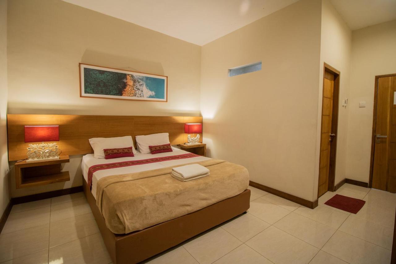 Kuta Suci Guesthouse Ngoại thất bức ảnh