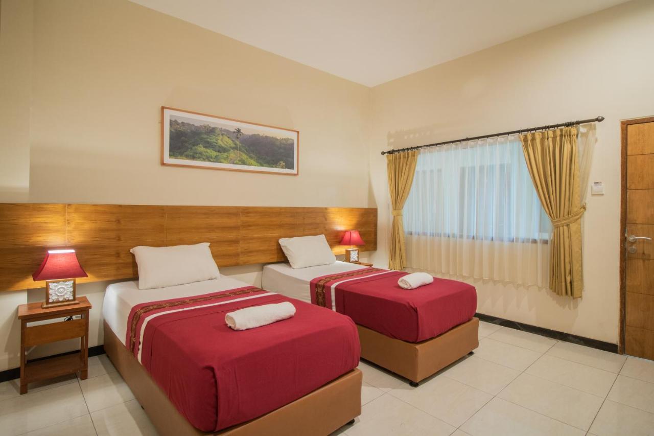 Kuta Suci Guesthouse Ngoại thất bức ảnh