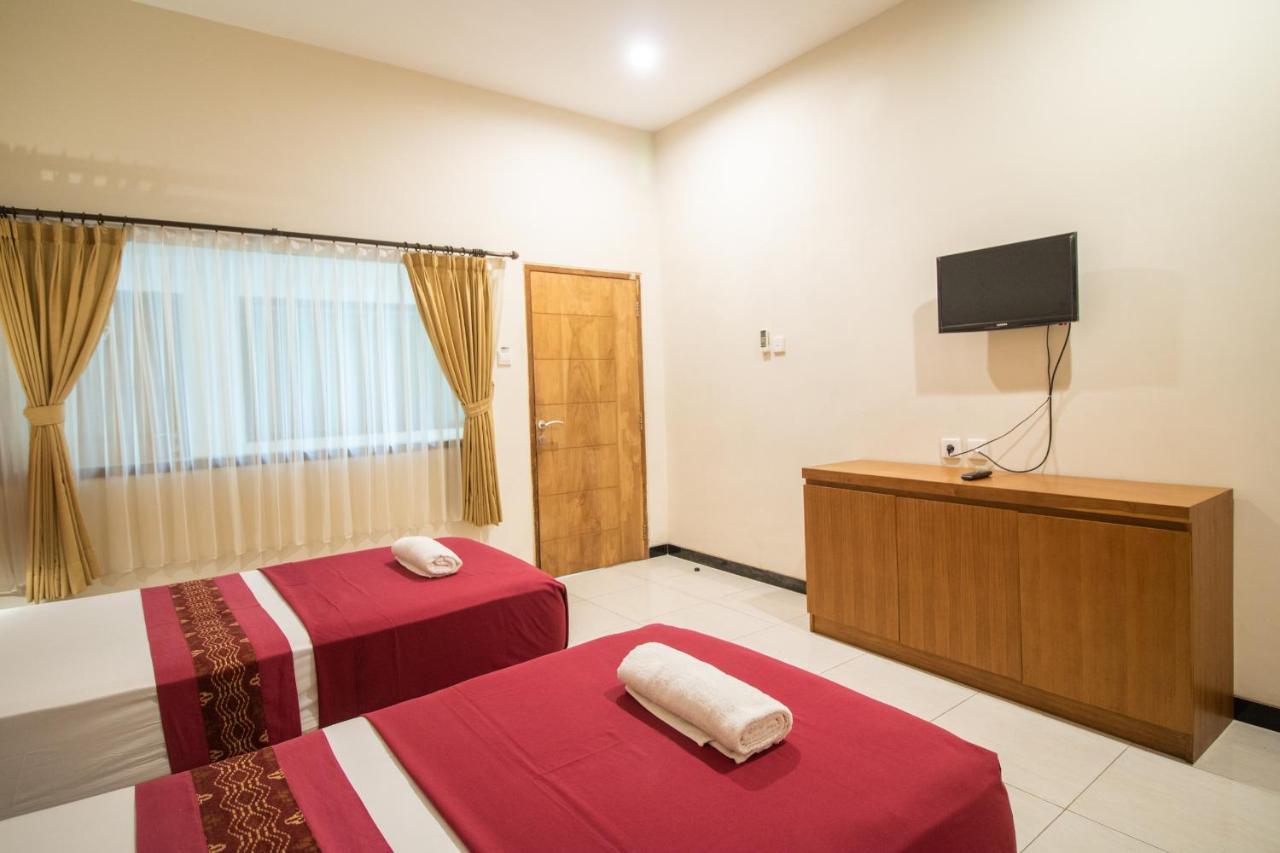 Kuta Suci Guesthouse Ngoại thất bức ảnh