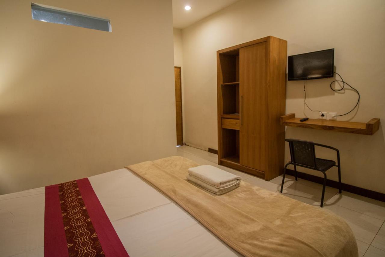 Kuta Suci Guesthouse Ngoại thất bức ảnh