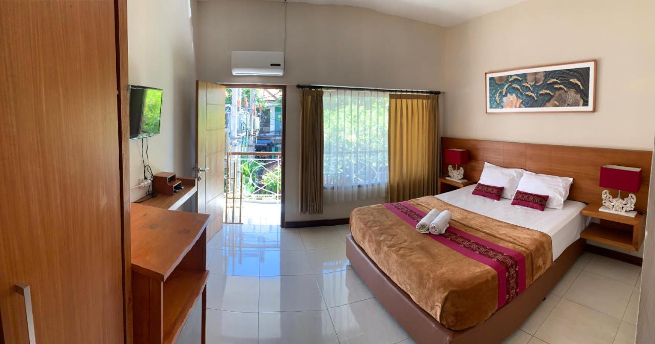 Kuta Suci Guesthouse Ngoại thất bức ảnh