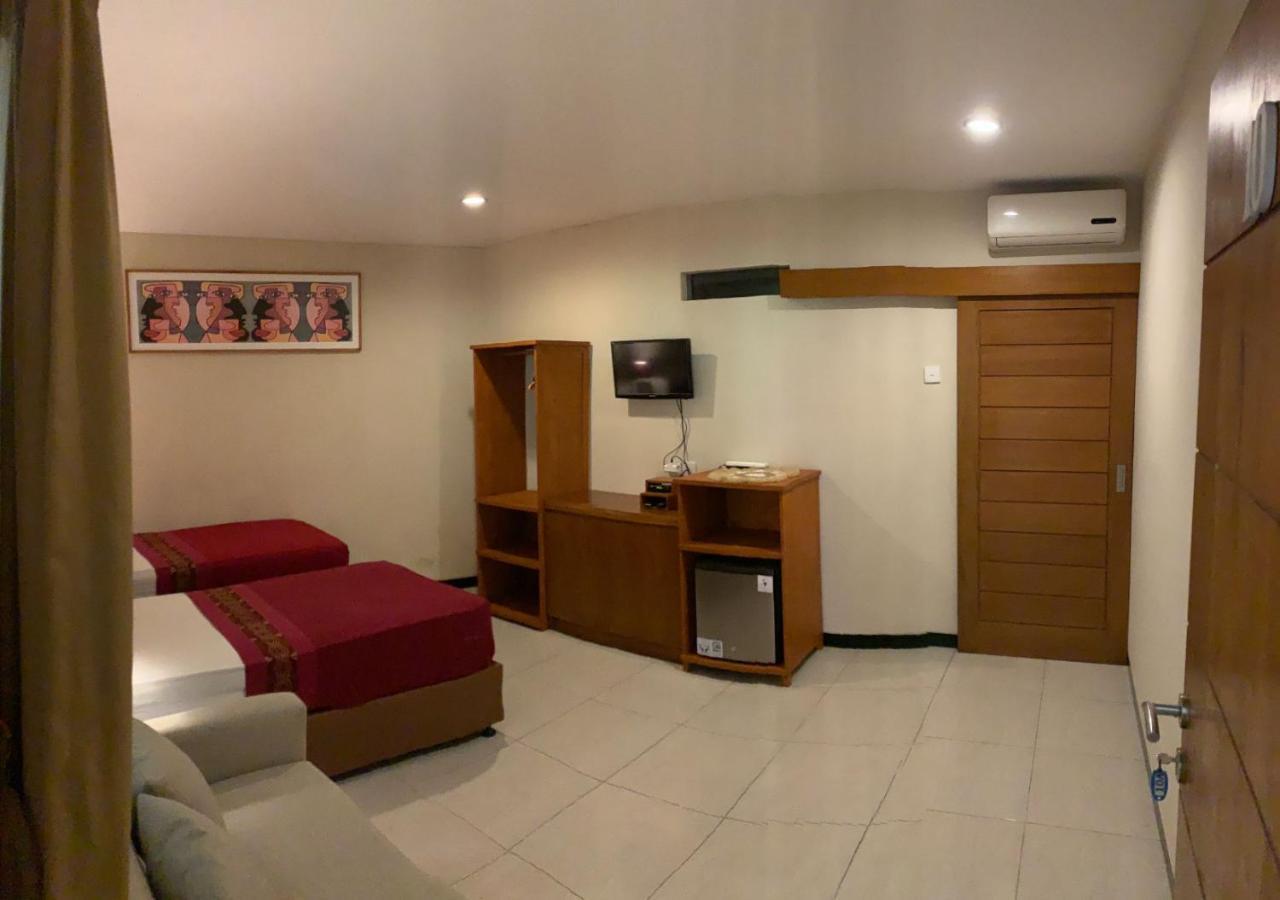 Kuta Suci Guesthouse Ngoại thất bức ảnh