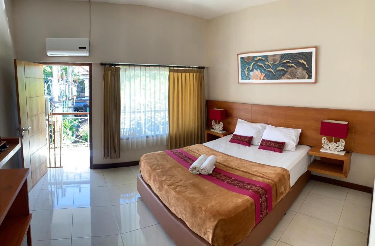 Kuta Suci Guesthouse Ngoại thất bức ảnh