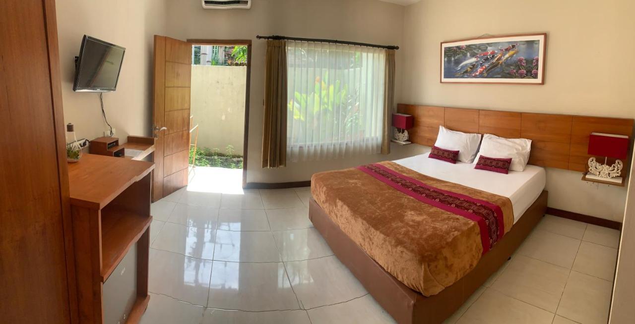 Kuta Suci Guesthouse Ngoại thất bức ảnh