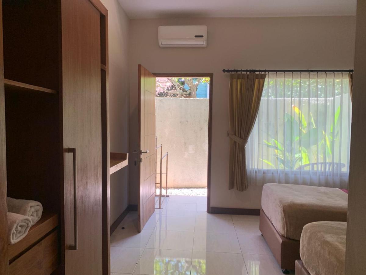 Kuta Suci Guesthouse Ngoại thất bức ảnh